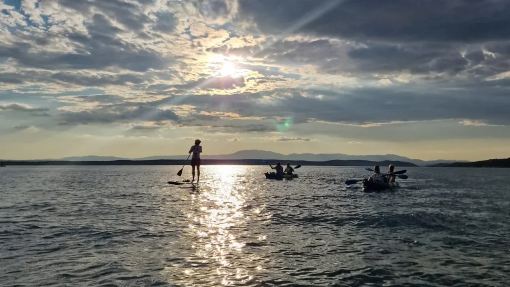 Kayak and stand-up paddle board on the sea